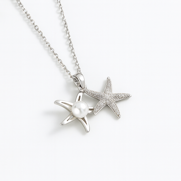 Estrella de mar con perla